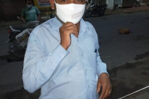 Mask distribution to newspaper hawkers