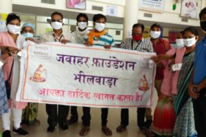 Mask distribution with Asha Sahogini workers